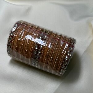 NWT Elegant Gold and peach Women's Bangles